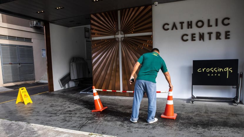 CCTV shows '7 to 8' people getting out of 2 cars and spraying unknown substances outside Catholic Centre, say workers