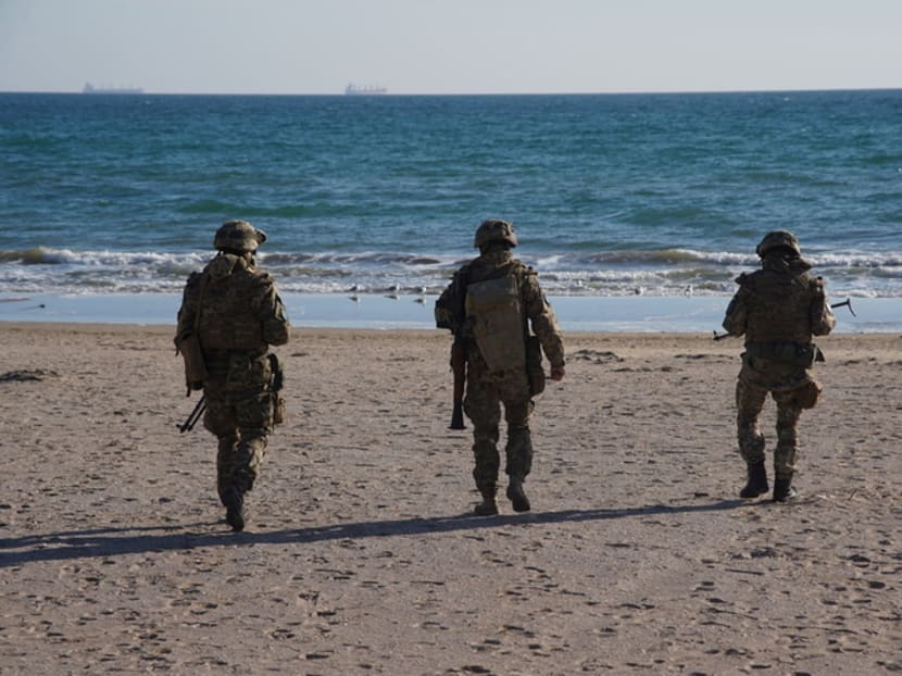 Members of the Ukrainian Armed Forces take part in coastal defence drills in the Odessa region, Ukraine, in this handout picture released January 28, 2022. Members of the Ukrainian Armed Forces take part in coastal defence drills in the Odessa region, Ukraine, in this handout picture released January 28, 2022.