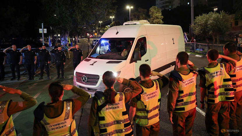 Hamas hands over hostage bodies after Israel threatens aid cut Hamas hands over hostage bodies after Israel threatens aid cut