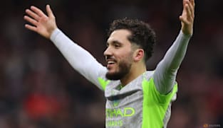 Man City go top with 2-1 win at Forest after Cherki heroics