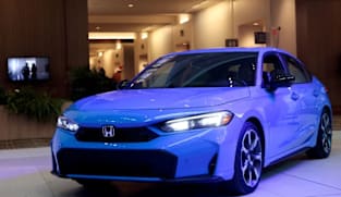 Honda cuts annual operating profit after posting Q2 drop