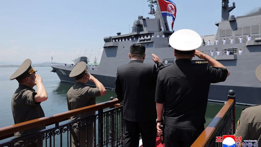 North Korea's Kim unveils plans for 10,000-ton warships, nuclear navy
