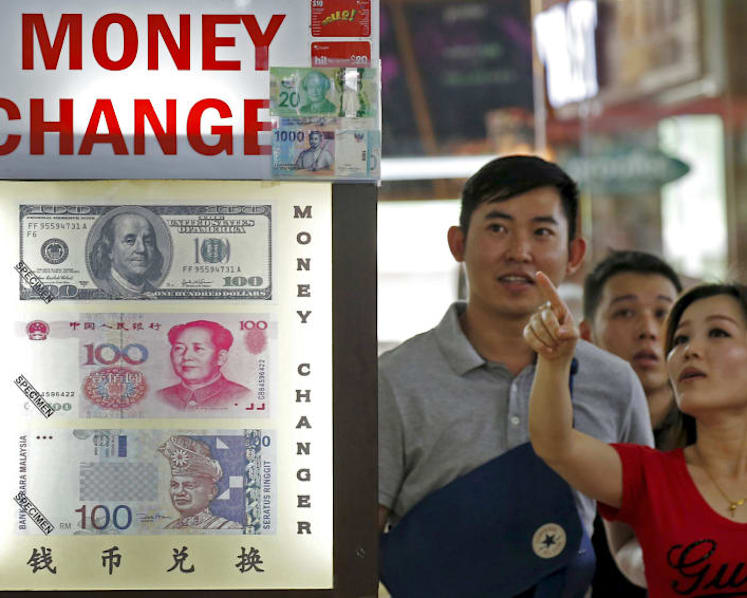 More people buying Chinese yuan at money changers in Singapore as currency weakens