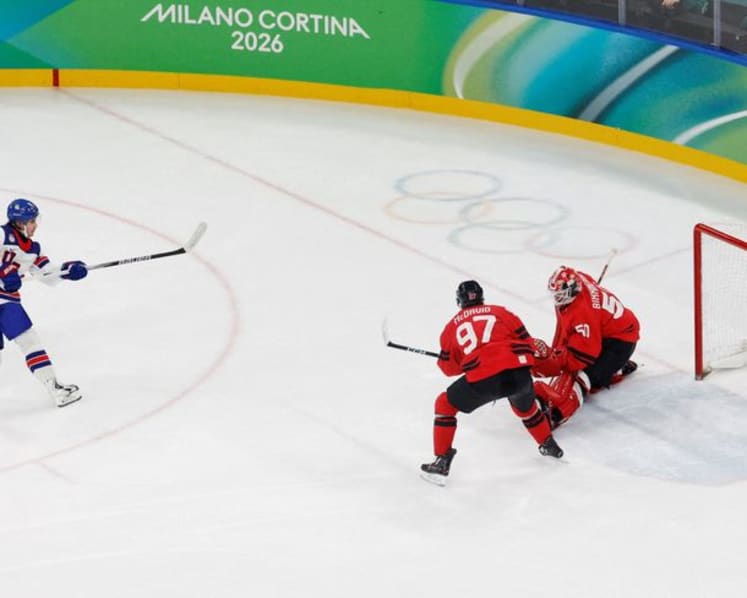 Ice hockey-US claim long-awaited gold by beating rivals Canada in overtime thriller