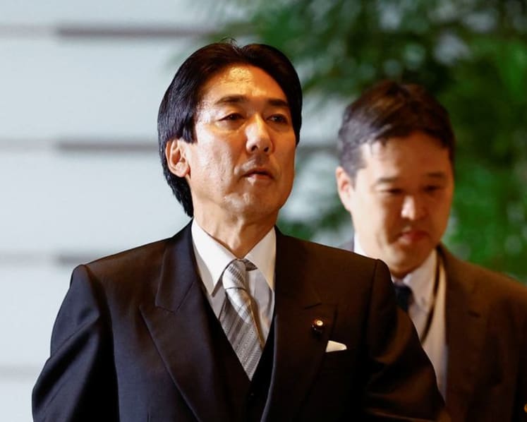 Japan's economy minister offers sanguine view on inflation
