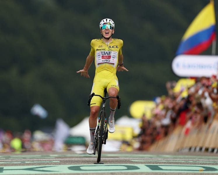 Pogacar rides to solo win on Tour de France stage 14 to increase overall lead
