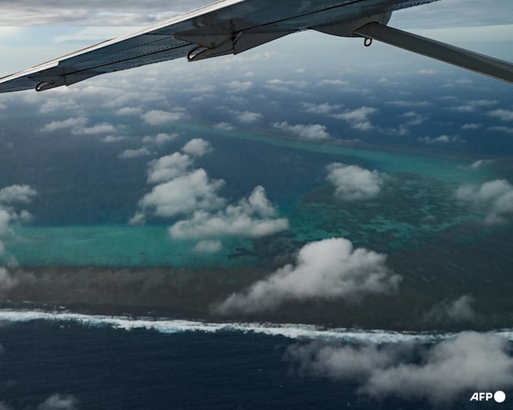 China conducts naval, air patrols around disputed South China Sea shoal