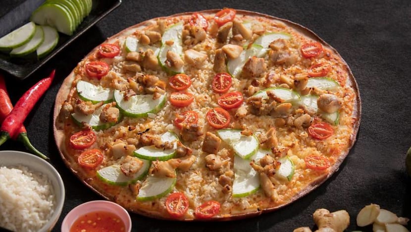 Pezzo Pizza offering Hainanese chicken rice and satay flavours
