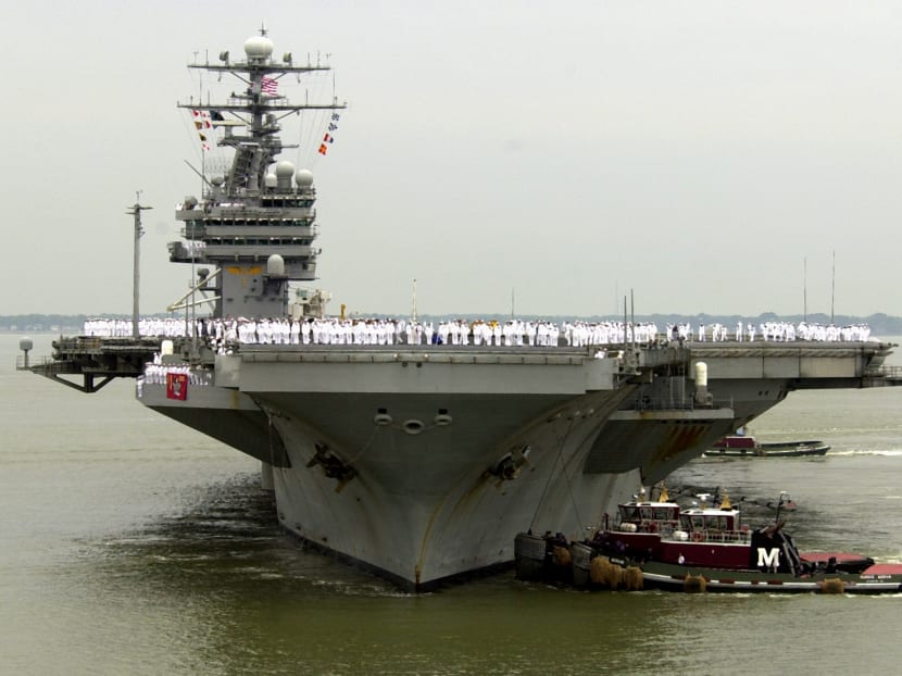 US Navy officials say the aircraft carrier USS Theodore Roosevelt is steaming toward the waters off Yemen and will join other American ships prepared to intercept any Iranian vessels carrying weapons to the rebels fighting in Yemen.  AP file photo