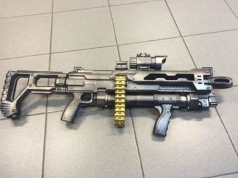 Police are investigating a 21-year-old man for causing public alarm by allegedly carrying a toy gun at Bugis MRT station. Photo: Singapore Police Force Police are investigating a 21-year-old man for causing public alarm by allegedly carrying a toy gun at Bugis MRT station. Photo: Singapore Police Force
