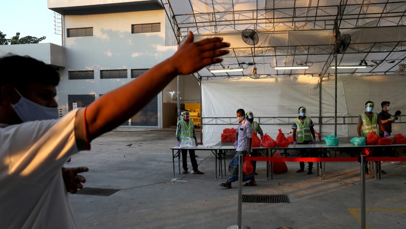 Food-tasting sessions and free Wi-Fi: What inter-agency teams at dorms have done for foreign workers’ well-being