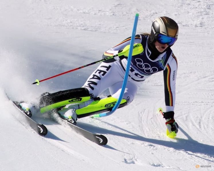 Alpine skiing-Suter wins Soldeu downhill, Aicher closes gap to absent Vonn