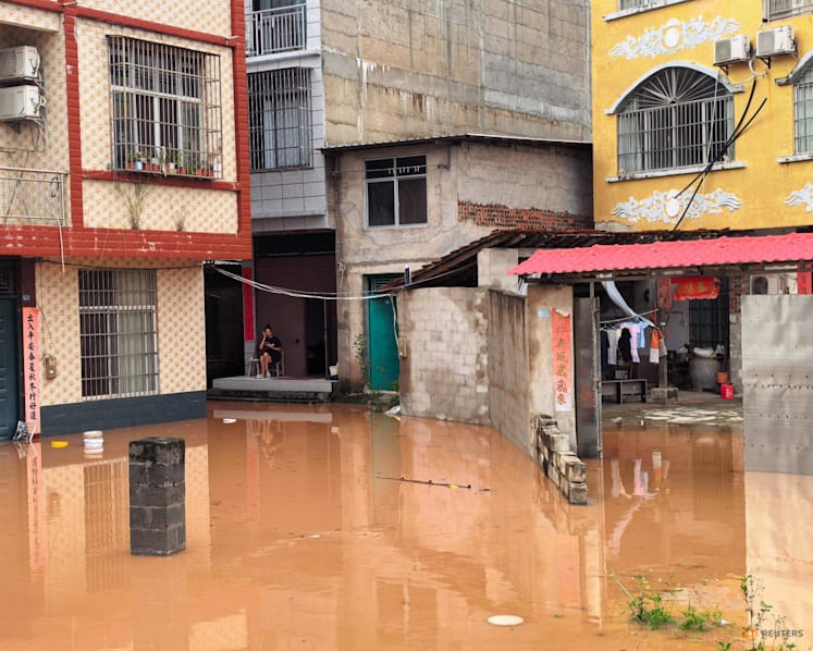 Homes submerged, tens of thousands relocated in China's south as flooding intensifies