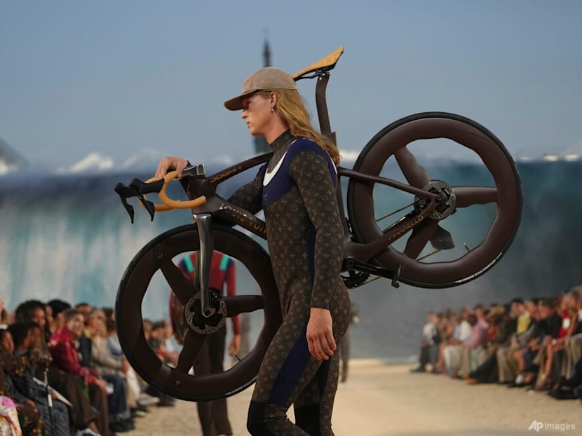 Louis Vuitton’s surfer dandy rides a giant wave at Pharrell Williams’ Paris Fashion Week show