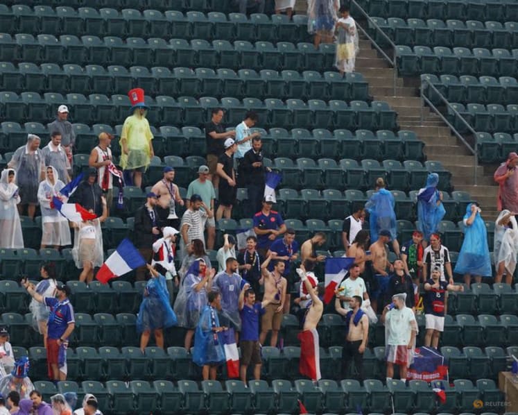France-Iraq World Cup game restarts after two-hour storm delay
