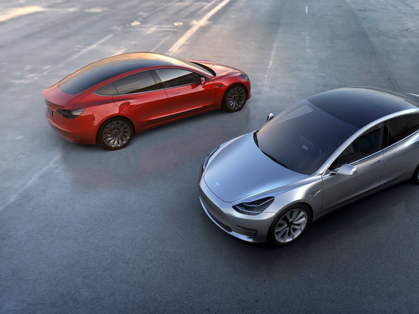 Tesla Motors' mass-market Model 3 electric cars are seen in this handout picture from Tesla Motors on March 31, 2016. Photo via Reuters Tesla Motors' mass-market Model 3 electric cars are seen in this handout picture from Tesla Motors on March 31, 2016. Photo via Reuters