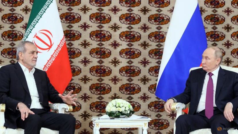 Russia's Putin cements ties with Iranian president in Central Asia meeting Russia's Putin cements ties with Iranian president in Central Asia meeting