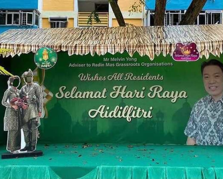 PA says use of woman's wedding photo for Hari Raya decor not racist; cancels meeting with her