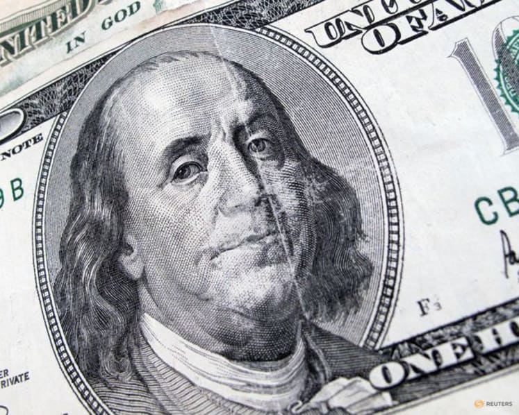 Dollar on back foot as US yields, crude prices dip; Aussie buoyed by hawkish RBA