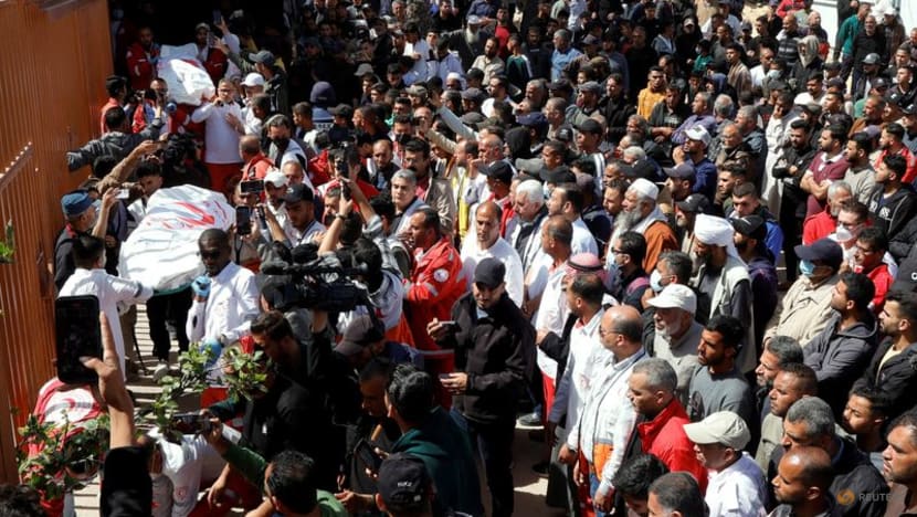 Bodies of Palestinian medics recovered from grave in Gaza, UN officials say Bodies of Palestinian medics recovered from grave in Gaza, UN officials say