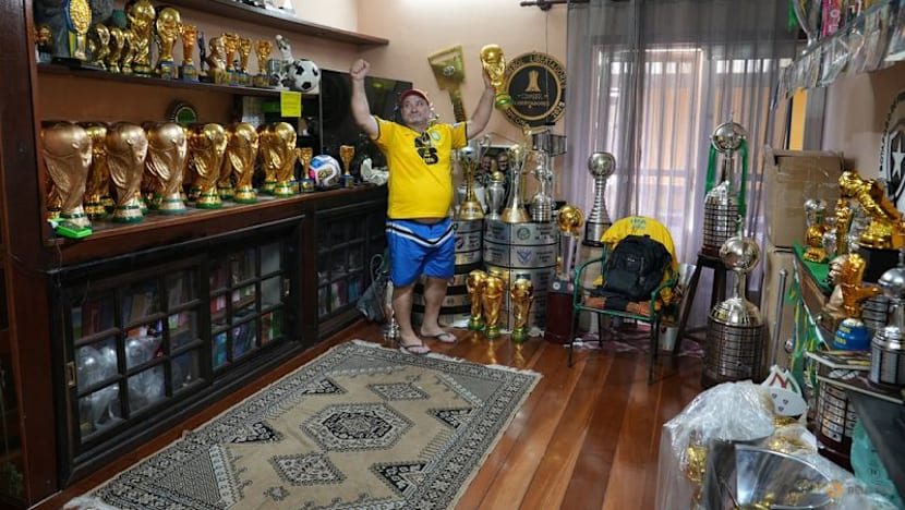 In Rio, artisan crafts World Cup trophies while hoping Brazil gets a real one