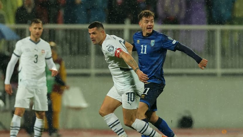 Switzerland seal World Cup place despite Kosovo fightback
