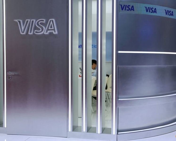Visa to lay off 7% of staff as efficiency push deepens