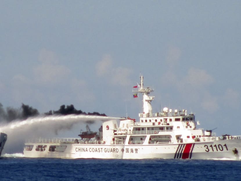 China asserts right to drill in disputed sea as stand-off mounts