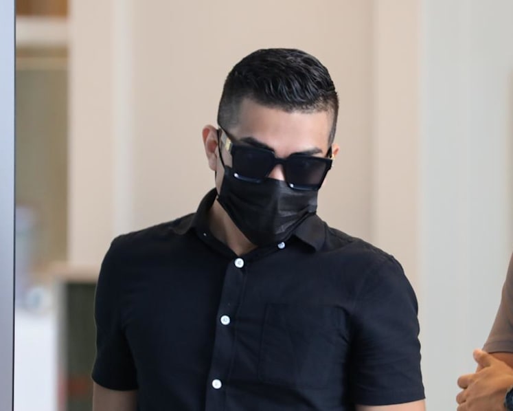 Man pleads guilty to consorting with friend who had loaded pistol, in first such case in a decade