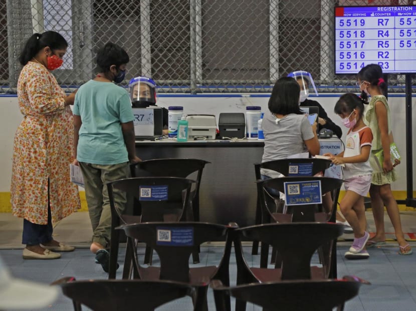 Parents and children at a vaccination centre for five- to 11-year-olds at Our Tampines Hub on Jan 12, 2022. Parents and children at a vaccination centre for five- to 11-year-olds at Our Tampines Hub on Jan 12, 2022.