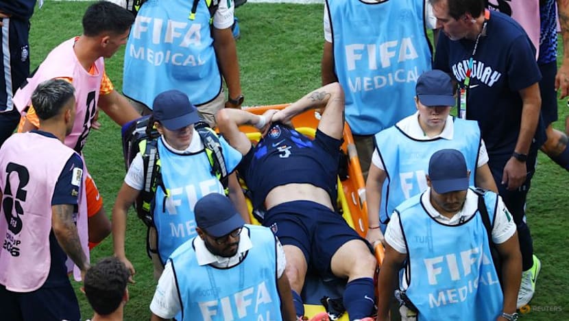 Uruguay's Ugarte suffers serious knee injury at World Cup