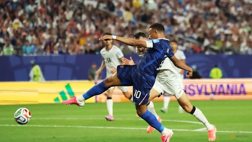 Mbappe double sends France into knockout rounds after lengthy weather delay