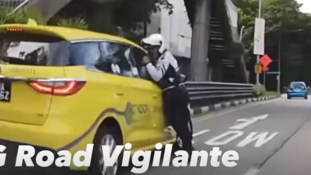 涉嫌开车使用手机还拖行导致交警骨折 德士司机被控