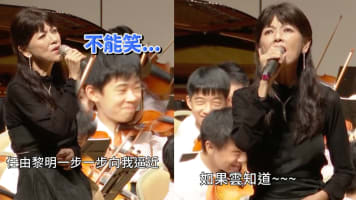 Student Orchestra Hilariously Fails To Stifle Laughter During Taiwanese Singer's Off-Key Performance