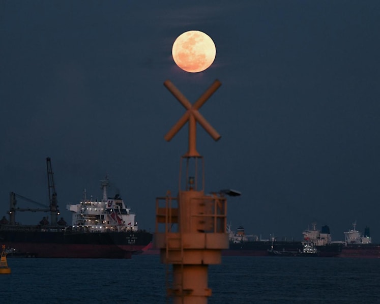 Rare 'strawberry supermoon' seen over Singapore