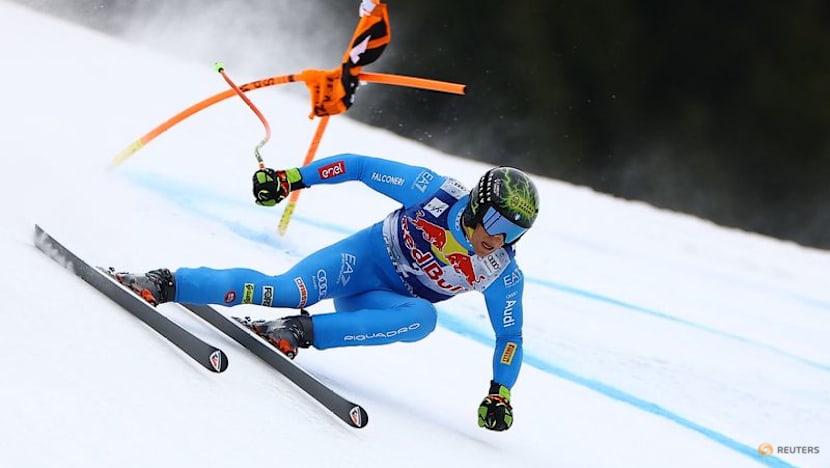 Alpine skiing-Franzoni wins Kitzbuehel downhill with Odermatt second
