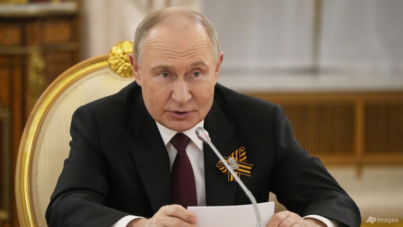  Putin hails troops in Ukraine as allies attend WWII parade