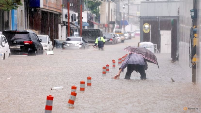Three dead as South Korean region hit by most rain in 120 years Three dead as South Korean region hit by most rain in 120 years