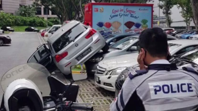 Car mounts two vehicles at Orchard Road car park, SCDF called in to extricate elderly person