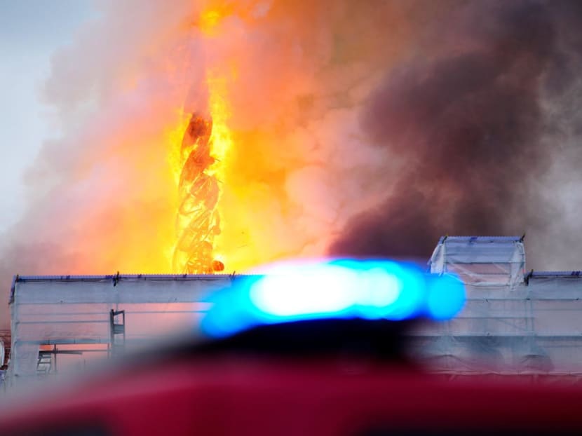 Smoke billows during a fire at the Old Stock Exchange, Boersen, in Copenhagen, Denmark on April 16, 2024. Smoke billows during a fire at the Old Stock Exchange, Boersen, in Copenhagen, Denmark on April 16, 2024.