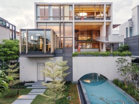 A Singapore home with zigzagging ramps and a cosy greenhouse