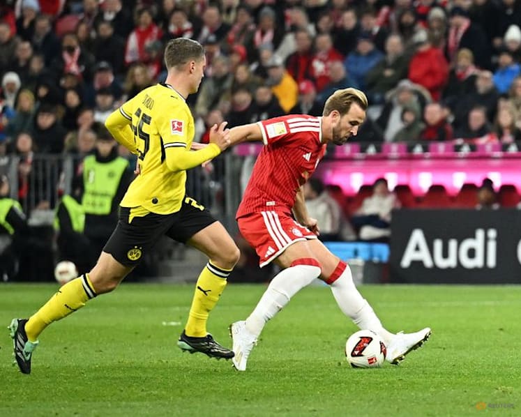 Kane misses penalty, hits post as Dortmund snatch draw