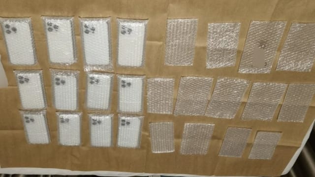 涉售卖冒牌苹果手机 两男被控上法庭