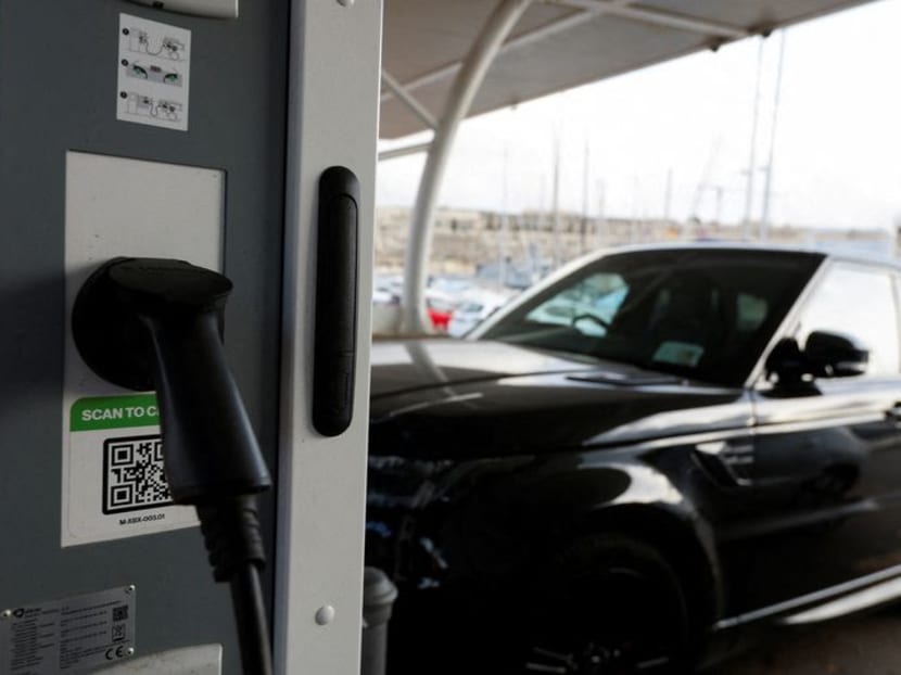 FILE PHOTO: A view of an electric vehicle plugged into a public charging station in Ta' Xbiex, Malta November 9, 2023. REUTERS/Darrin Zammit Lupi/File Photo