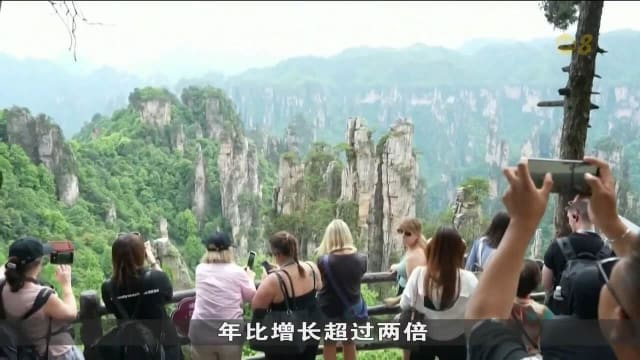 繁华城市自然风光兼具 中国放宽免签后成外国游客首选