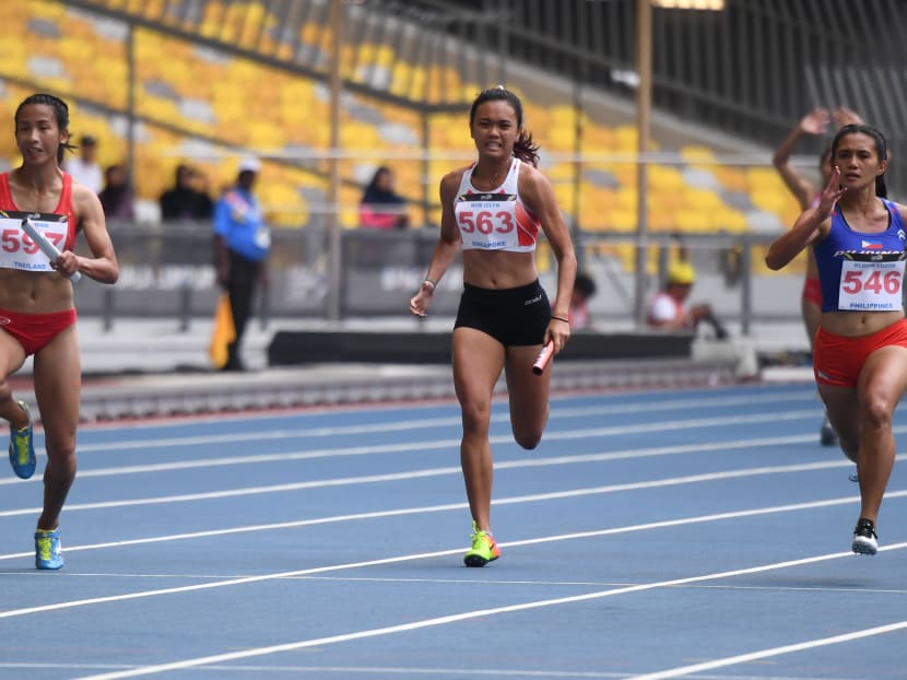 Nur Izlyn (centre) taking part in the women's 4x100m relay. Photo: Suki Singh/Sport Singapore