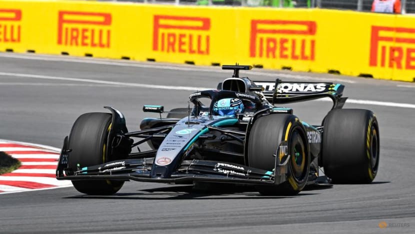 Russell wins in Canada as McLarens collide