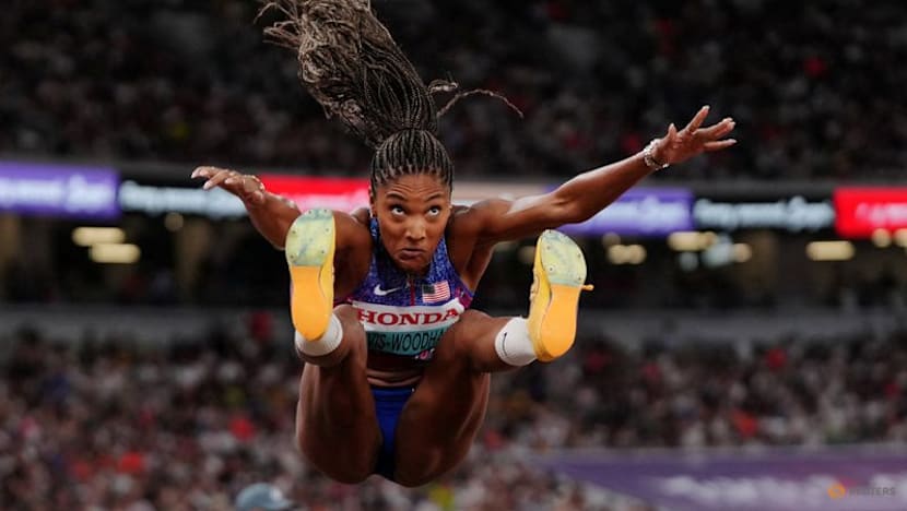 Davis-Woodhall adds world long jump title to Olympic crown