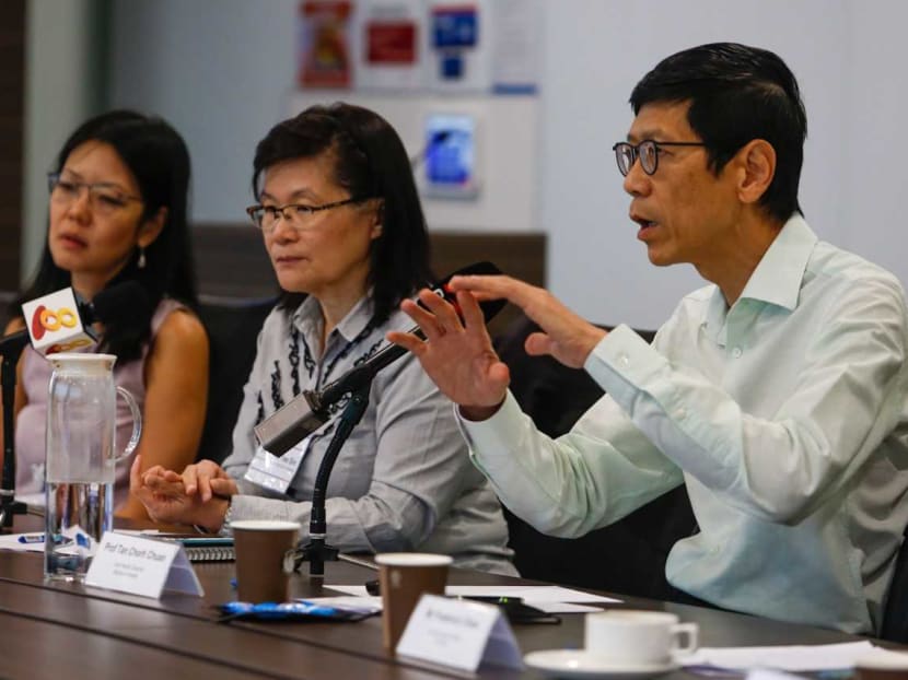 Professor Tan Chorh Chuan (right), chief health scientist with the Ministry of Health, speaking at a media conference on Feb 10, 2020.