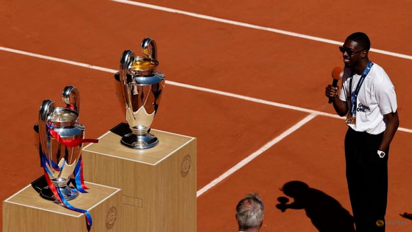 PSG players celebrate Champions League back-to-back titles with French Open crowd